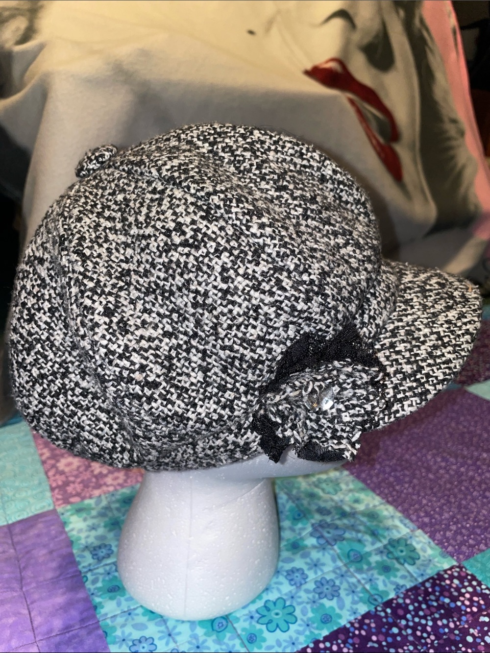 Vintage Black & white textured newsboy cap featuring knit lace rhinestone flower